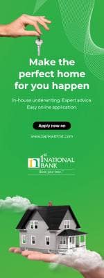 Vertical banner for 1st national bank featuring a hand holding a key above a green background with the text'Make the perfect home for you happen. In-house underwriting. Expert advice. Easy online application. Apply now on www.1stnational.com.' The bank's logo and tagline, 'We're your bank,' appear at the bottom above an image of a house with clouds around it